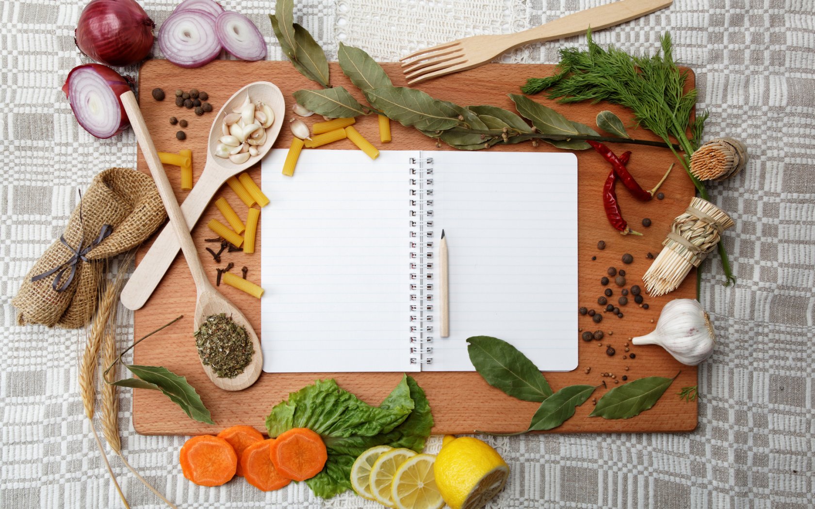 food-dill-paprika-bay-onion-leaves-lemon-garlic-notebook-pencil-1680x1050